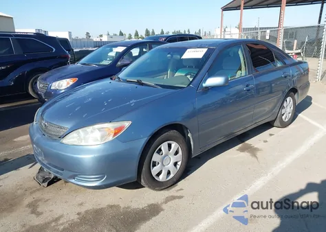 2003 Toyota Camry Le z USA, uszkodzony, nr VIN 4T1BE32K23U732018
